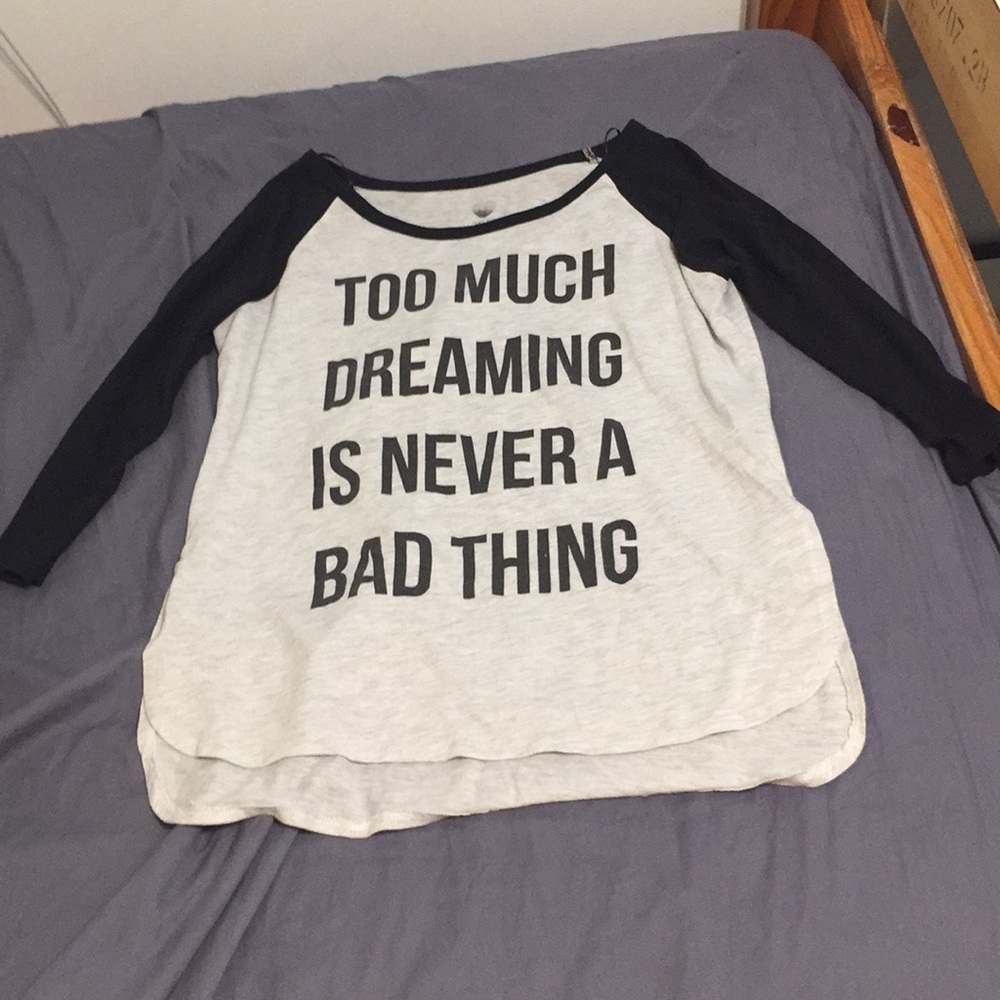 A baseball t shirt that says